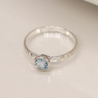 Sterling Silver Hammered Ring with Blue Topaz