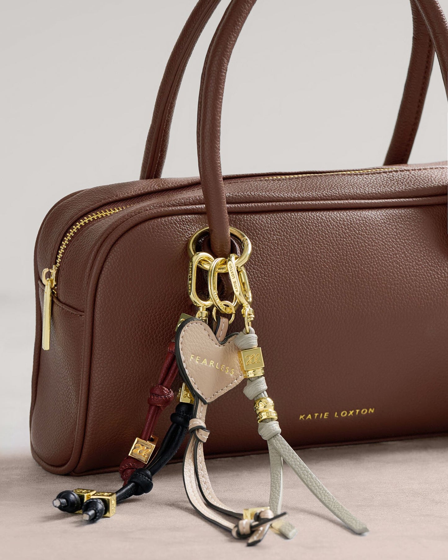Katie Loxton Heart Bag Charm Keyring 'Fearless' in Latte