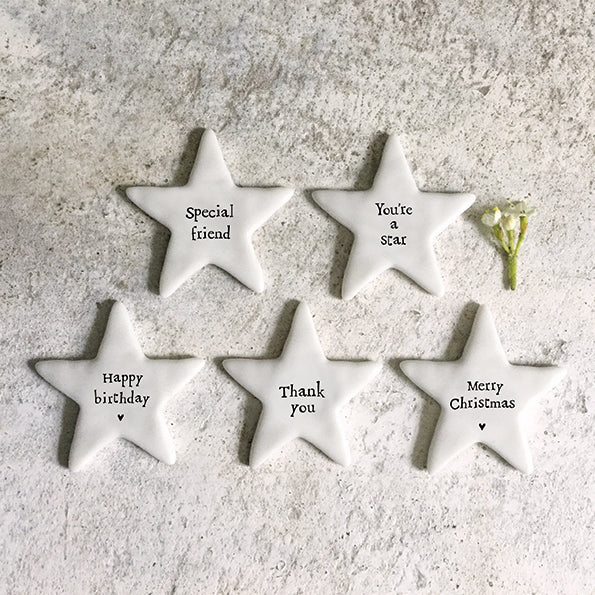 Tiny Porcelain Star Token Merry Christmas
