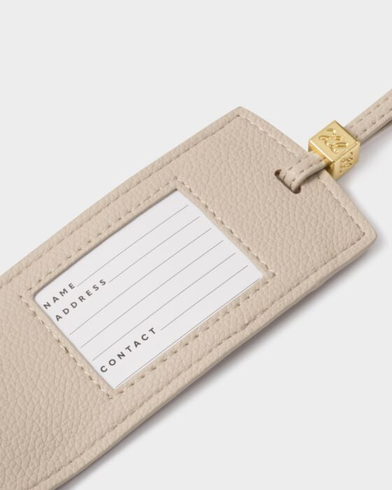 Katie Loxton Luggage Tag ‘Le Soleil’ in Oyster